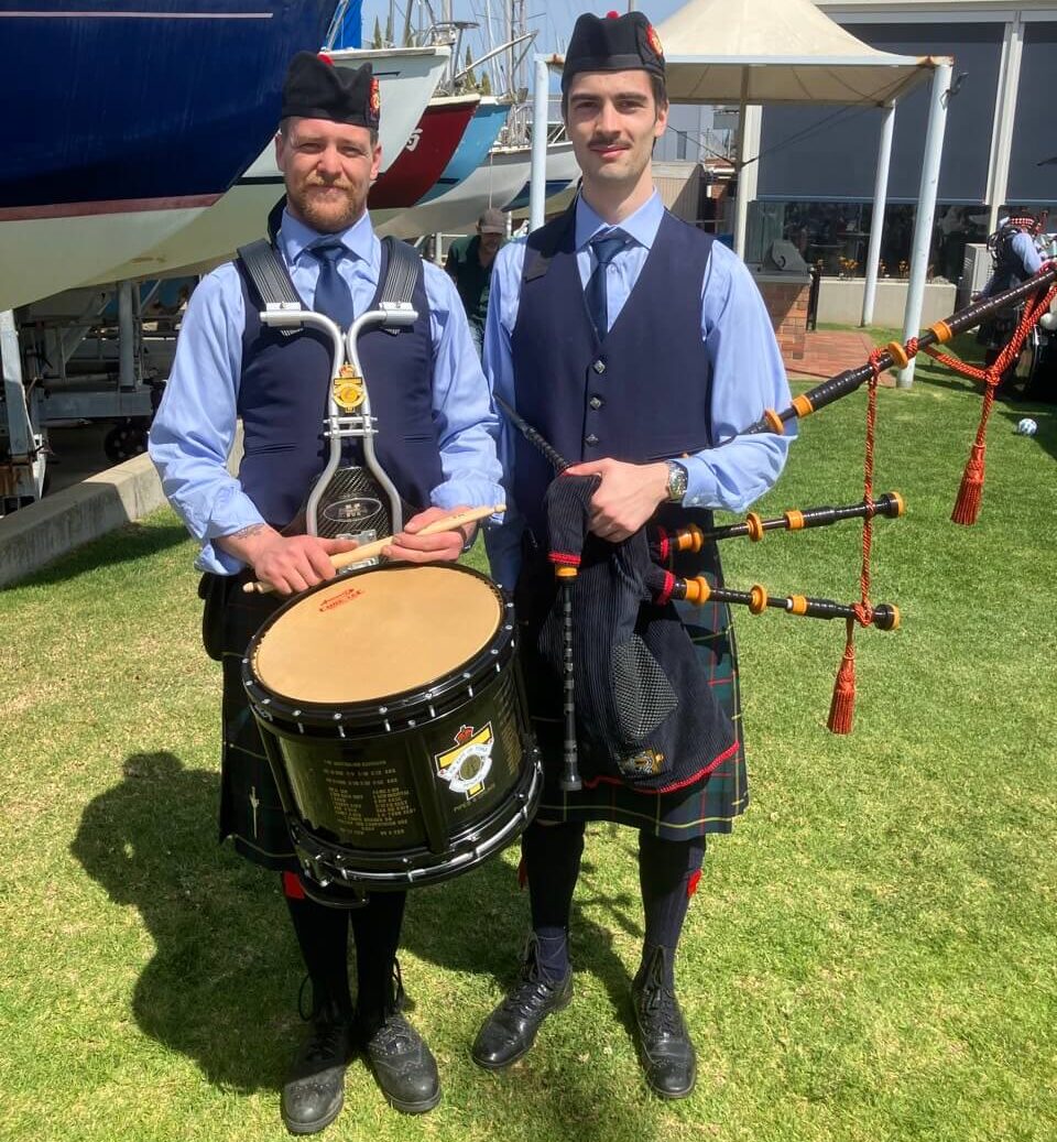 Rats of Tobruk Memorial Pipes and Drums bagpiper performing at an event in Melbourne