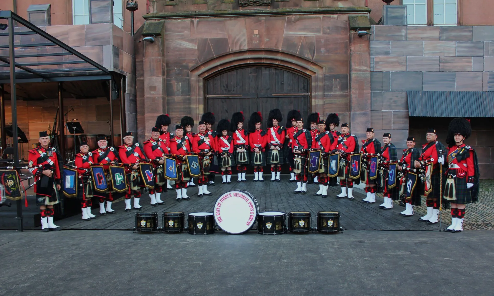 Rats of Tobruk Memorial Pipes and Drums performing at international military tattoos in Switzerland and Italy